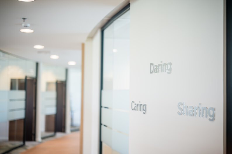 SMT corporate values, caring, daring, sharing