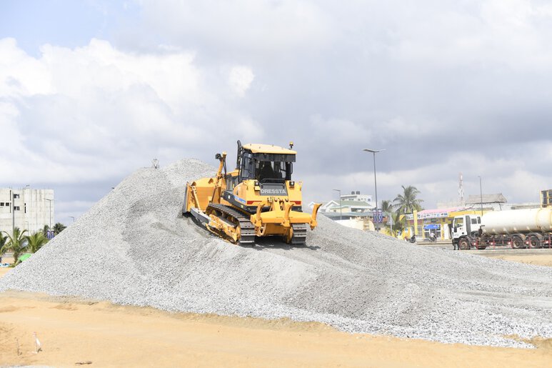 Dressta crawler dozer optimized for demanding road construction projects in synergy with Dynapac paving equipment