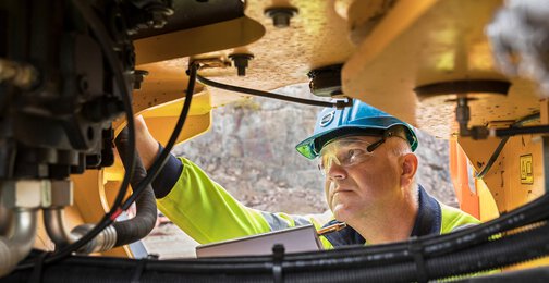 Technician utilizing a genuine driveline repair kit, a fast and complete solution for restoring transmission and axle performance with factory-spec parts.